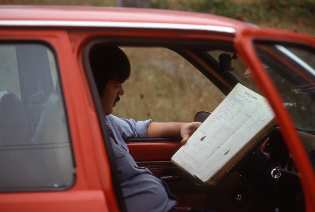 Rich peruses a borrowed funeral registry in search of old Dick Parmeter.
